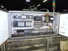 Used Tisma Automatic Horizontal Glue Cartoner, Model 600-SE. Capable of speeds over 200 CPM. Has 5