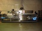 Used Uhlmann Model C2205 automatic blister cartoner. Capable of speeds up to 250 cartons per minute. Has a 5