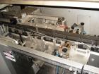 Used Uhlmann Model C2205 automatic blister cartoner. Capable of speeds up to 250 cartons per minute. Has a 5