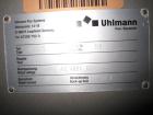 Used Uhlmann Model C2205 automatic blister cartoner. Capable of speeds up to 250 cartons per minute. Has a 5