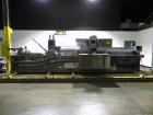 Used Uhlmann Model C2206 Automatic Horizontal Cartoner. Machine is capable of speeds up to 200 cartons per minute. Has 6