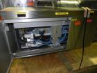 Used Uhlmann Model C2206 Automatic Horizontal Cartoner. Machine is capable of speeds up to 200 cartons per minute. Has 6