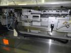 Used Uhlmann Model C2206 Automatic Horizontal Cartoner. Machine is capable of speeds up to 200 cartons per minute. Has 6