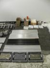 Used Uhlmann Model C2206 Automatic Horizontal Cartoner. Machine is capable of speeds up to 200 cartons per minute. Has 6
