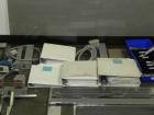 Used Uhlmann Model C2206 Automatic Horizontal Cartoner. Machine is capable of speeds up to 200 cartons per minute. Has 6