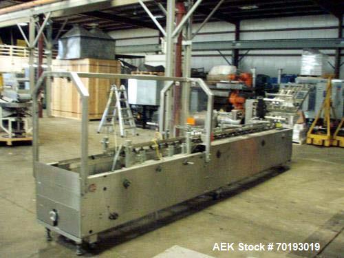 Used- Adco Semi Automatic Horizontal Cartoner, Model 15D105-SS. Set on 12" centers. Has approximately 8 1/2' long load area....