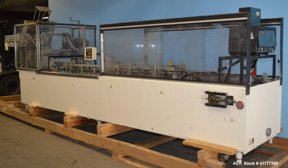 Used Adco Horizontal Glue Cartoner, Model 15E60EC. Has (3) head rotary carton feed. 6' long manual load area. Nordson hot melt glue system. Capable of speeds from 20 to 120 cartons per minute. Has 14...