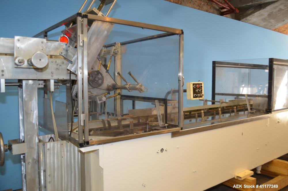 Used Adco Horizontal Glue Cartoner, Model 15E60EC. Has (3) head rotary carton feed. 6' long manual load area. Nordson hot melt glue system. Capable of speeds from 20 to 120 cartons per minute. Has 14...