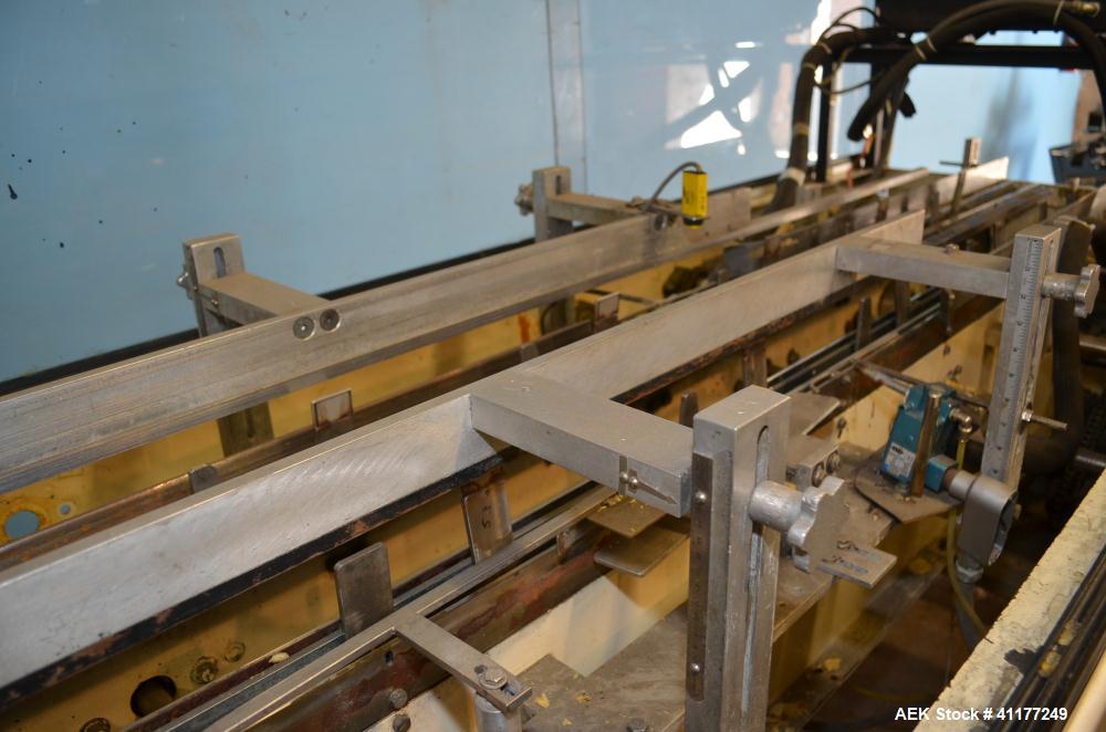 Used Adco Horizontal Glue Cartoner, Model 15E60EC. Has (3) head rotary carton feed. 6' long manual load area. Nordson hot melt glue system. Capable of speeds from 20 to 120 cartons per minute. Has 14...