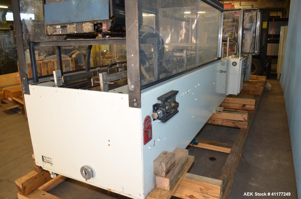 Used Adco Horizontal Glue Cartoner, Model 15E60EC. Has (3) head rotary carton feed. 6' long manual load area. Nordson hot melt glue system. Capable of speeds from 20 to 120 cartons per minute. Has 14...