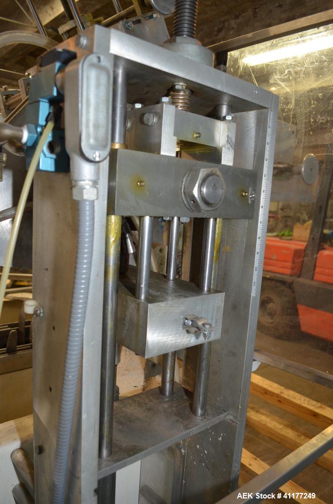 Used Adco Horizontal Glue Cartoner, Model 15E60EC. Has (3) head rotary carton feed. 6' long manual load area. Nordson hot melt glue system. Capable of speeds from 20 to 120 cartons per minute. Has 14...