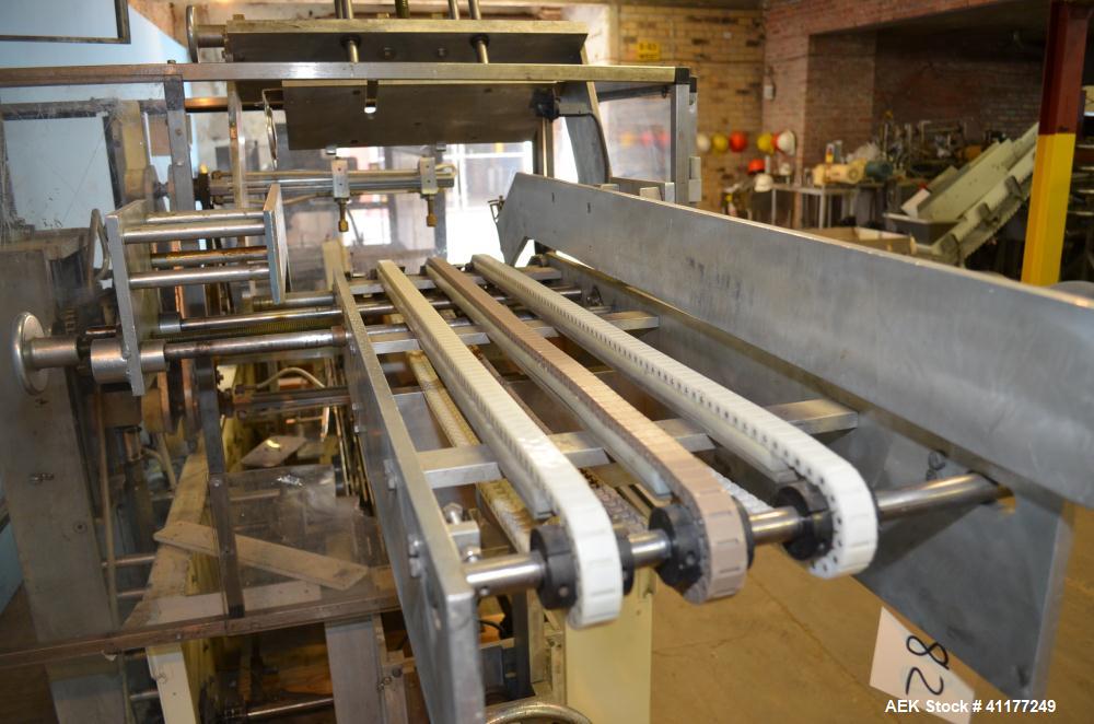 Used Adco Horizontal Glue Cartoner, Model 15E60EC. Has (3) head rotary carton feed. 6' long manual load area. Nordson hot melt glue system. Capable of speeds from 20 to 120 cartons per minute. Has 14...