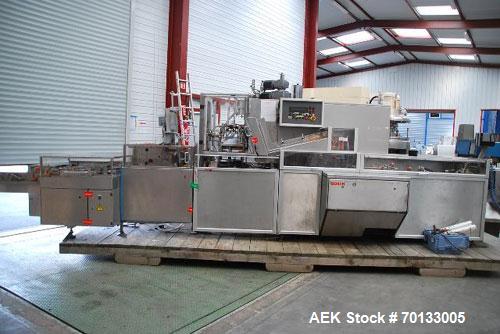 Used Bosch CUK-3040 Automatic Cartoner with continuous motion for bottles, tubes, cans, etc.Comprised of:3.3" x 67" (82 x 1700 mm) infeed PVC conveyor, tilting station, adjustable buckets, vertical m...