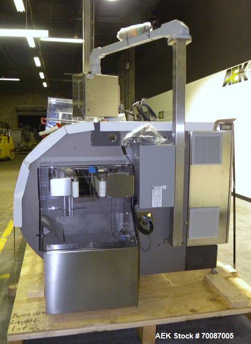 Used Bosch CUT120 Automatic Intermittent Motion Horizontal Tuck Cartoner. Capable of speeds up to 120 cartons per minute. Has adjustable bucket infeed on 5" centers for a carton size range: length 20...
