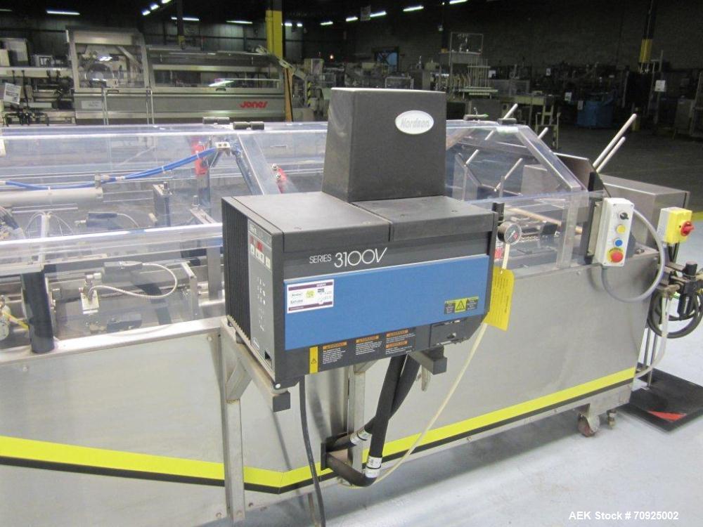 Used Econocorp Spartan Automatic Horizontal Glue Cartoner capable of speeds up to 30-50 cartons per minute. Has 12" centers for carton size range: length 2" - 10" or 51mm to 254mm, width 1" - 4" or 2...