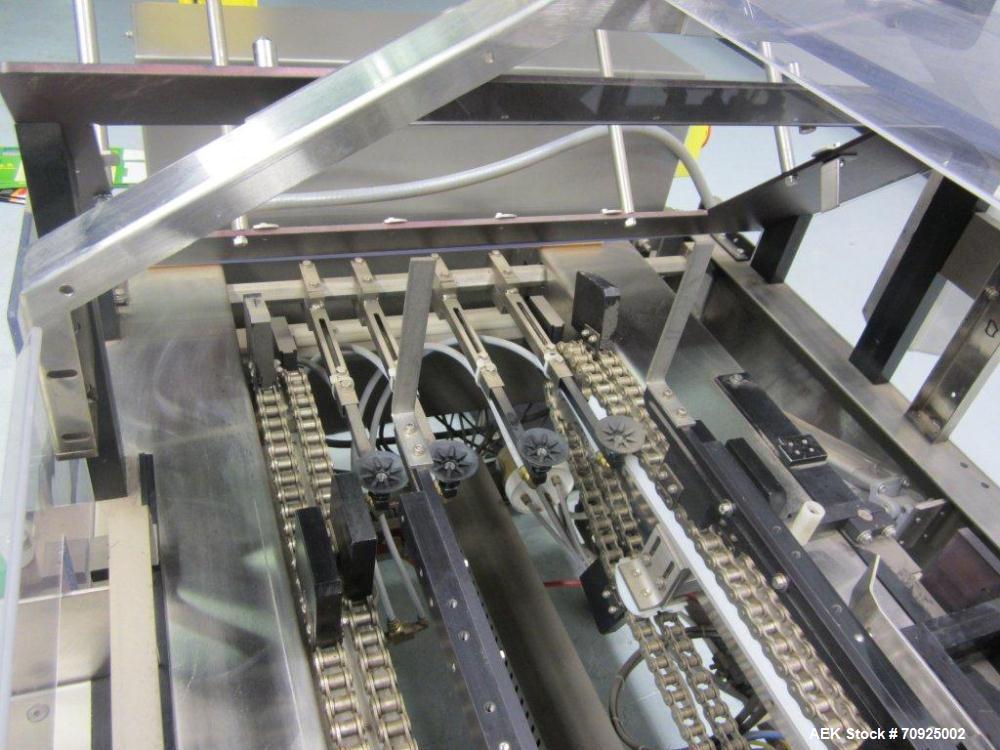 Used Econocorp Spartan Automatic Horizontal Glue Cartoner capable of speeds up to 30-50 cartons per minute. Has 12" centers for carton size range: length 2" - 10" or 51mm to 254mm, width 1" - 4" or 2...