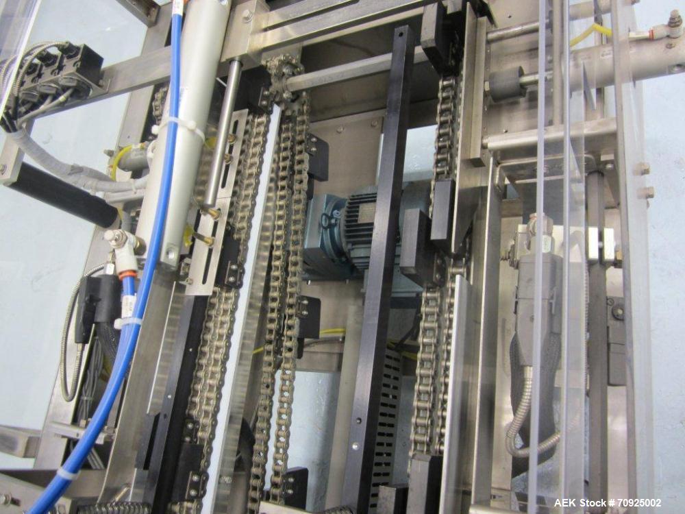 Used Econocorp Spartan Automatic Horizontal Glue Cartoner capable of speeds up to 30-50 cartons per minute. Has 12" centers for carton size range: length 2" - 10" or 51mm to 254mm, width 1" - 4" or 2...