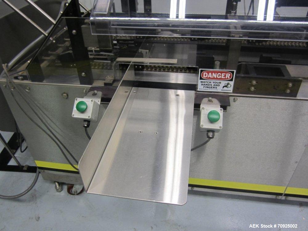 Used Econocorp Spartan Automatic Horizontal Glue Cartoner capable of speeds up to 30-50 cartons per minute. Has 12" centers for carton size range: length 2" - 10" or 51mm to 254mm, width 1" - 4" or 2...