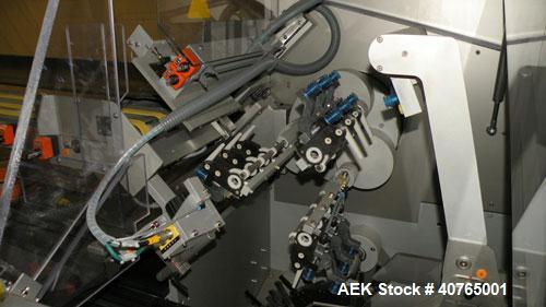 Used IWKA Cartopac SC6 Automatic Horizontal Cartoner. Capable of speeds up to 300 BPM. Has 6" centers for a carton size range: length 20 to 125mm, width 15 to 110mm, depth 85 to 230mm. Has 15' long a...