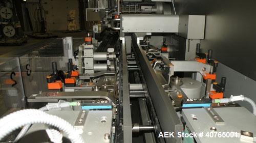 Used IWKA Cartopac SC6 Automatic Horizontal Cartoner. Capable of speeds up to 300 BPM. Has 6" centers for a carton size range: length 20 to 125mm, width 15 to 110mm, depth 85 to 230mm. Has 15' long a...