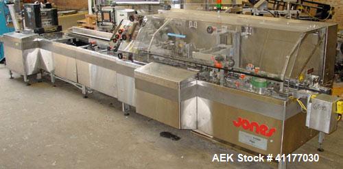Used Jones Legacy Automatic Quick Change Small Footprint Cartoner. Machine is of Stainless Steel Construction and is capable of speeds up to 400 CPM. Has 4" centers with adjustable buckets for a cart...