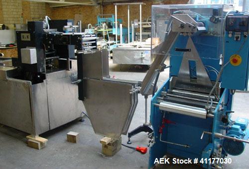 Used Jones Legacy Automatic Quick Change Small Footprint Cartoner. Machine is of Stainless Steel Construction and is capable of speeds up to 400 CPM. Has 4" centers with adjustable buckets for a cart...
