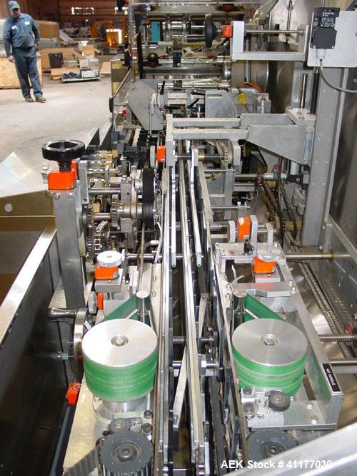 Used Jones Legacy Automatic Quick Change Small Footprint Cartoner. Machine is of Stainless Steel Construction and is capable of speeds up to 400 CPM. Has 4" centers with adjustable buckets for a cart...