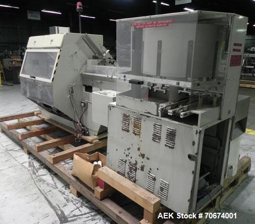 Used Marchesini BA400 Automatic Horizontal Cartoner capable of speeds up to 400 cartons per minute. Has 4" centers for a carton size range: length 25mm - 70mm, width 15mm - 70mm, depth 78mm - 150mm. ...