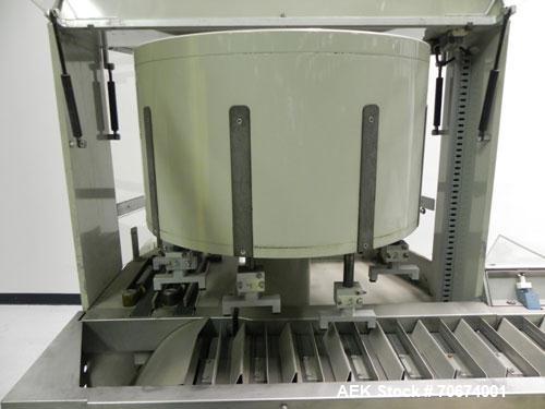 Used Marchesini BA400 Automatic Horizontal Cartoner capable of speeds up to 400 cartons per minute. Has 4" centers for a carton size range: length 25mm - 70mm, width 15mm - 70mm, depth 78mm - 150mm. ...