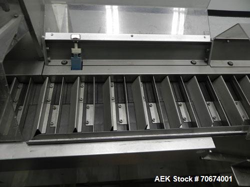Used Marchesini BA400 Automatic Horizontal Cartoner capable of speeds up to 400 cartons per minute. Has 4" centers for a carton size range: length 25mm - 70mm, width 15mm - 70mm, depth 78mm - 150mm. ...