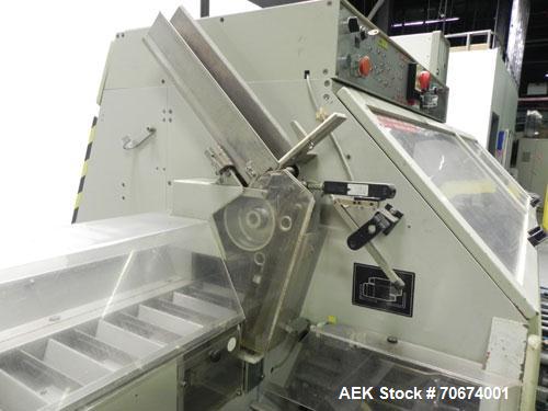 Used Marchesini BA400 Automatic Horizontal Cartoner capable of speeds up to 400 cartons per minute. Has 4" centers for a carton size range: length 25mm - 70mm, width 15mm - 70mm, depth 78mm - 150mm. ...