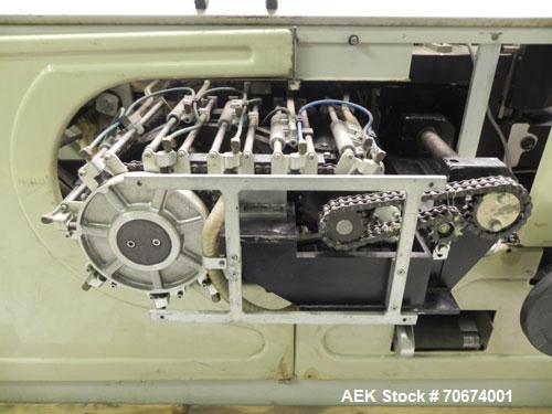 Used Marchesini BA400 Automatic Horizontal Cartoner capable of speeds up to 400 cartons per minute. Has 4" centers for a carton size range: length 25mm - 70mm, width 15mm - 70mm, depth 78mm - 150mm. ...