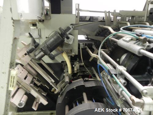 Used Marchesini BA400 Automatic Horizontal Cartoner capable of speeds up to 400 cartons per minute. Has 4" centers for a carton size range: length 25mm - 70mm, width 15mm - 70mm, depth 78mm - 150mm. ...