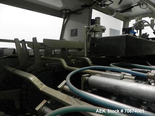 Used Marchesini BA400 Automatic Horizontal Cartoner capable of speeds up to 400 cartons per minute. Has 4" centers for a carton size range: length 25mm - 70mm, width 15mm - 70mm, depth 78mm - 150mm. ...