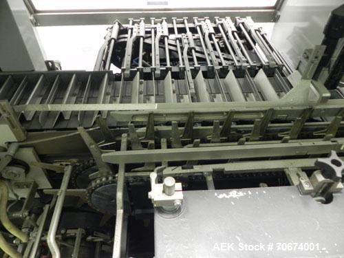 Used Marchesini BA400 Automatic Horizontal Cartoner capable of speeds up to 400 cartons per minute. Has 4" centers for a carton size range: length 25mm - 70mm, width 15mm - 70mm, depth 78mm - 150mm. ...
