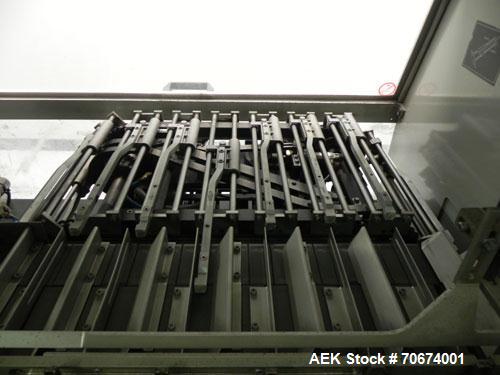 Used Marchesini BA400 Automatic Horizontal Cartoner capable of speeds up to 400 cartons per minute. Has 4" centers for a carton size range: length 25mm - 70mm, width 15mm - 70mm, depth 78mm - 150mm. ...