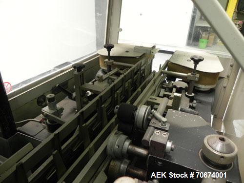 Used Marchesini BA400 Automatic Horizontal Cartoner capable of speeds up to 400 cartons per minute. Has 4" centers for a carton size range: length 25mm - 70mm, width 15mm - 70mm, depth 78mm - 150mm. ...
