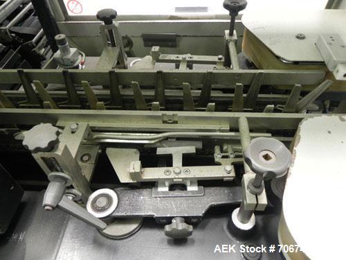 Used Marchesini BA400 Automatic Horizontal Cartoner capable of speeds up to 400 cartons per minute. Has 4" centers for a carton size range: length 25mm - 70mm, width 15mm - 70mm, depth 78mm - 150mm. ...
