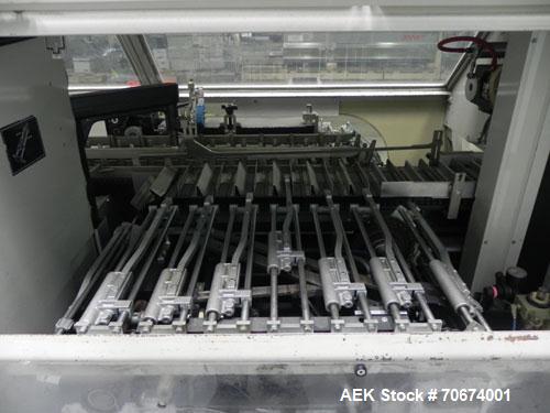 Used Marchesini BA400 Automatic Horizontal Cartoner capable of speeds up to 400 cartons per minute. Has 4" centers for a carton size range: length 25mm - 70mm, width 15mm - 70mm, depth 78mm - 150mm. ...