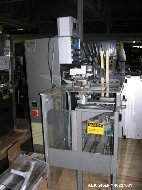 Unused- Uhlmann cartoner, model C100. Rated up to 100 cartons per minute, capable of handling up to 100mm x 85mm x 150mm cartons. 220/380 volt, serial #665.