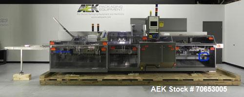 Used Uhlmann Model C2205 Automatic Bottle Cartoner. Capable of speeds up to 250 cartons per minute. Is a continuous motion cartoner. Has a 5" pitch for a Maximum carton size range: (Length) 150mm (6"...