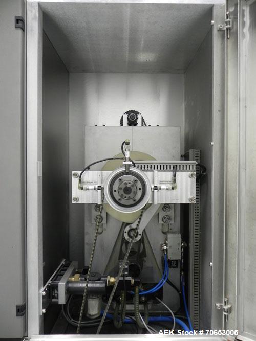 Used Uhlmann Model C2205 Automatic Bottle Cartoner. Capable of speeds up to 250 cartons per minute. Is a continuous motion cartoner. Has a 5" pitch for a Maximum carton size range: (Length) 150mm (6"...