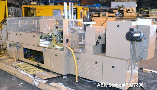 Used Zanasi Automatic Horizontal Continuous Motion Cartoner, Model KA, S/N 54127. This is a standard cartoner which was last running 5th panel tuck cartons, last running tubes and includes infeed sec...