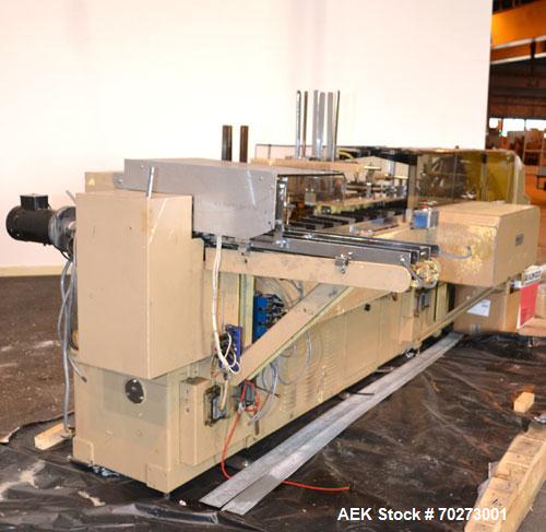 Used Zanasi Automatic Horizontal Continuous Motion Cartoner, Model KA, S/N 54127. This is a standard cartoner which was last running 5th panel tuck cartons, last running tubes and includes infeed sec...