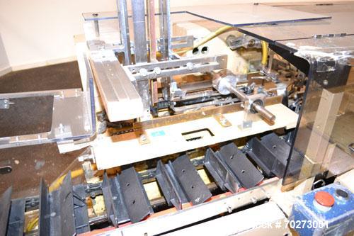 Used Zanasi Automatic Horizontal Continuous Motion Cartoner, Model KA, S/N 54127. This is a standard cartoner which was last running 5th panel tuck cartons, last running tubes and includes infeed sec...