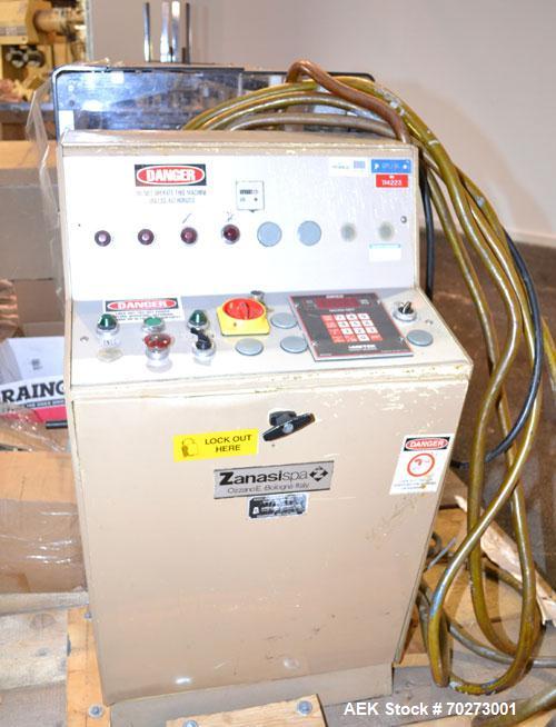 Used Zanasi Automatic Horizontal Continuous Motion Cartoner, Model KA, S/N 54127. This is a standard cartoner which was last running 5th panel tuck cartons, last running tubes and includes infeed sec...