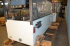 Used Adco Horizontal Glue Cartoner, Model 15E60EC. Has (3) head rotary carton feed. 6' long manual load area. Nordson hot melt glue system. Capable of speeds from 20 to 120 cartons per minute. Has 14...