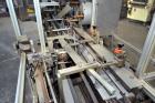 Used IWKA CPR Automatic Horizontal Bottle Cartoner capable of speeds up to 200 cartons per minute. Has a carton size range: A- 20 - 105mm, B 15 - 70mm, C 55 - 85mm. Model CPR.  With adjustable bucket...