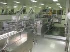 Used IWKA Model CPSR Automatic Horizontal Cartoner. Capable of speeds up to 250 cartons per minute. Has automatic bottle loader and dual blister feeders. Has 4
