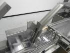 Used IWKA Model CPSR Automatic Horizontal Cartoner. Capable of speeds up to 250 cartons per minute. Has automatic bottle loader and dual blister feeders. Has 4